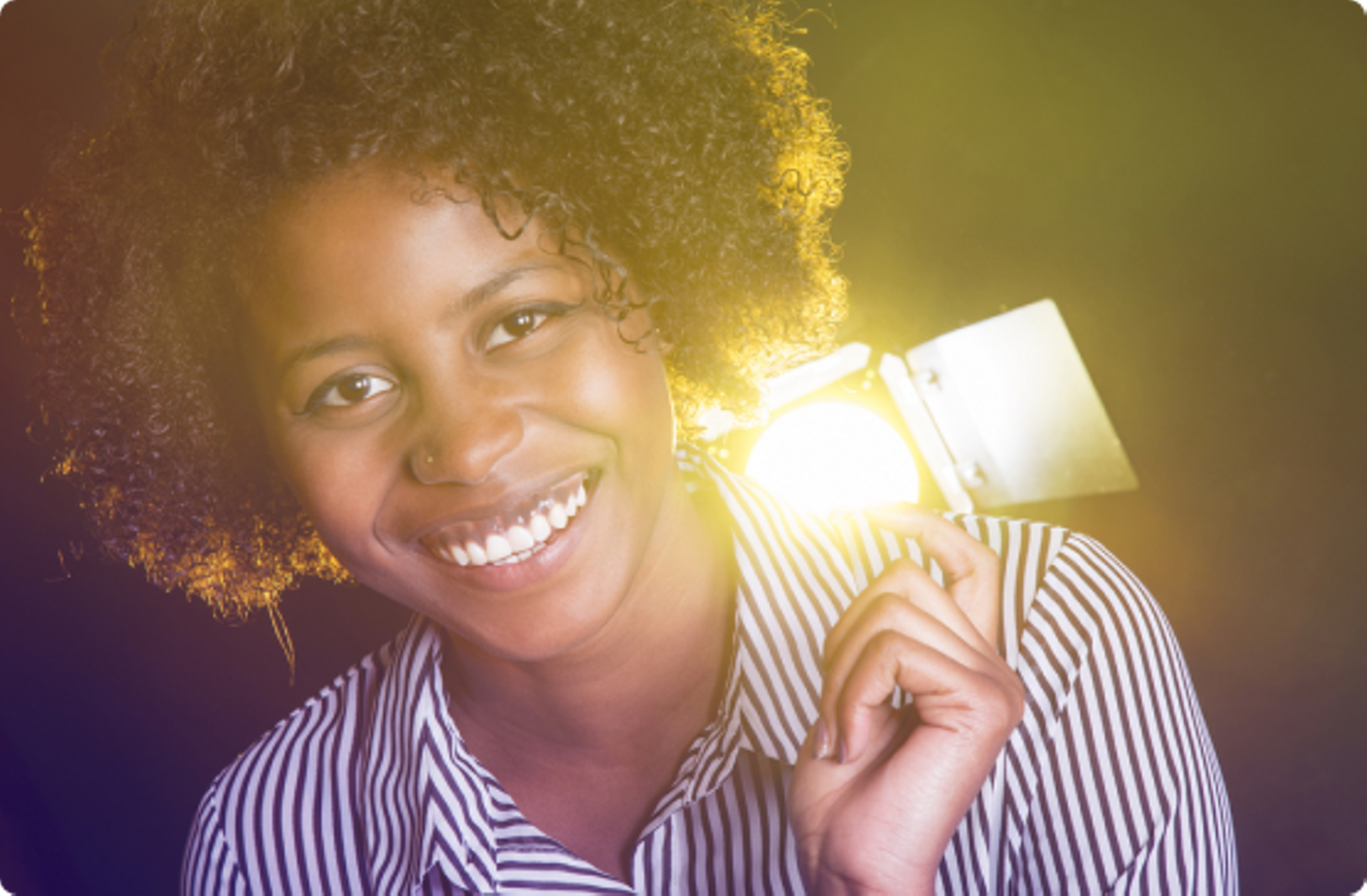 Lady with lights beaming from behind her